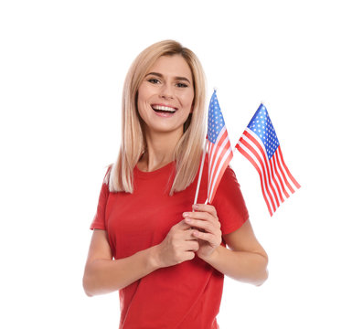 Portrait of woman with American flags on white background