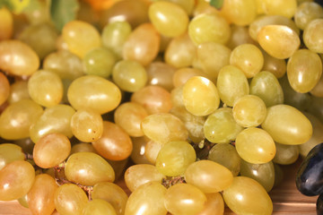 Fresh ripe juicy grapes on table, closeup