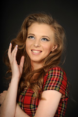 portrait of a beautiful young brunette in the studio