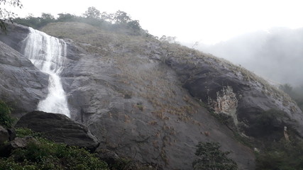 Water fall from a rocky hill.