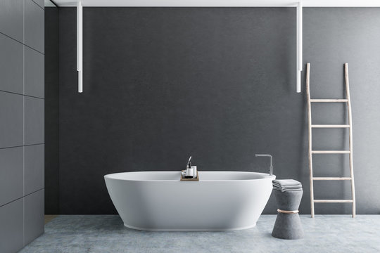 Gray tile bathroom, tub and ladder
