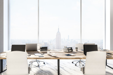 Loft office interior with cityscape
