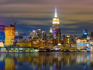 Fototapeta na wymiar Manhattan Skyline ,waterfront and skyline viewed from the Hudson River Hoboken NJ