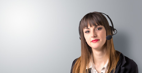 Young female telemarketer on a white background