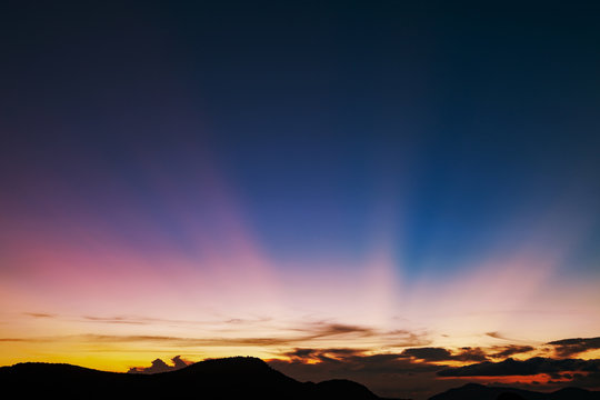 Fototapeta Beautiful light sunset or sunrise at phuket thailand scenery background.