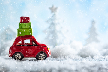 Red toy Santa's car with gifts