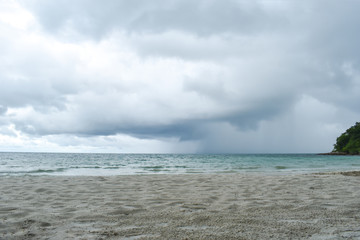 Rain storm of the sea. In the evening.