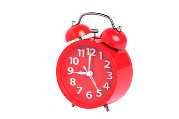 Red clock isolated on white background with clipping path.
