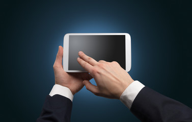 Hand using tablet with no concept and empty space
