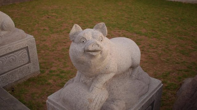 mythical statue of pig sculpture in satya dharma temple benoa bali indonesia