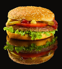 bacon Burger on black mirror with reflection