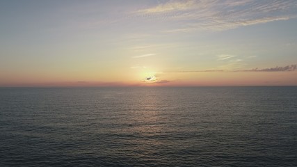 Ocean at sunrise aerial view
