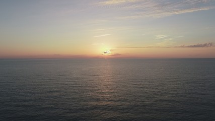 Ocean at sunrise aerial view
