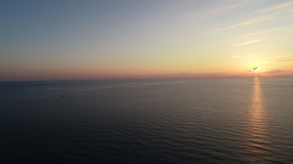 Obraz premium Ocean at sunrise aerial view