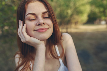 Fototapeta premium happy woman eyes closed cottage