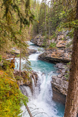 Fototapeta na wymiar View at the Johnston creek in Johnston Canyon of Banff National Park in Canadian Rocky Mountains - Canada