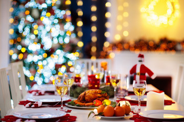 Christmas dinner at fire place and Xmas tree.