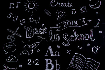Fototapeta na wymiar Handwritten school concept on blackboard written with chalk. Back to School