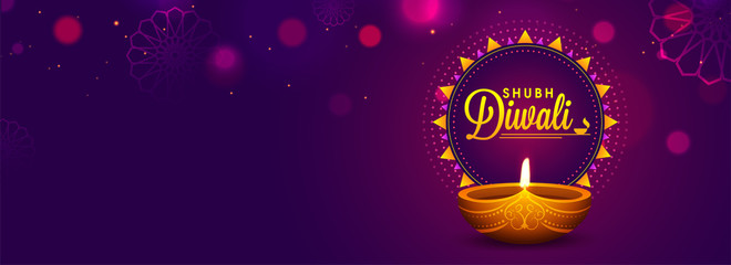 Fototapeta premium Website header or banner design with realistic oil lamp on purple background for Diwali Festival celebration.