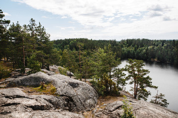 nature of Russia. republic of karelia. Rocky shore of the Karelian lake. Calmness on the lake shore.