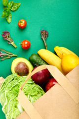  Grocering concept. Full paper bag of different fruits