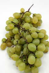 Big, white grape close-up on white background. 