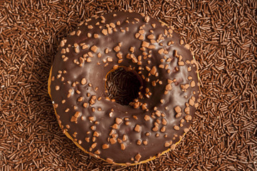 donut with chocolate frosting like sweet concept with graphic concept background 