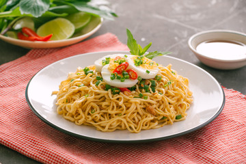 Dry instant noodle - asian ramen and vegetables for the soup