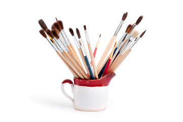 Paintbrushes in the pitcher