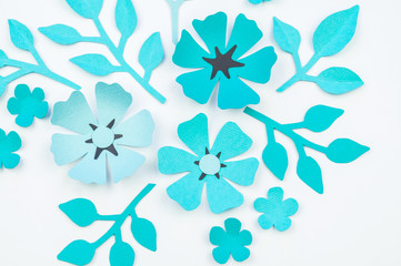 Flower and leaf of blue color made of paper