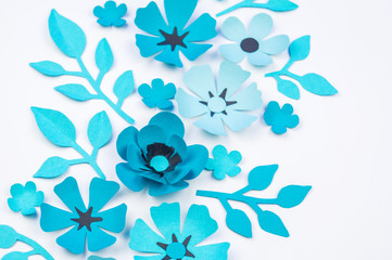 Flower and leaf of blue color made of paper