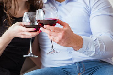 Young pair drinking wine in romantic concept