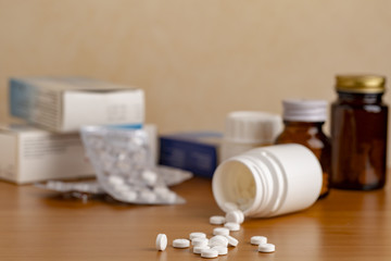 Different medicine bottles an various pills