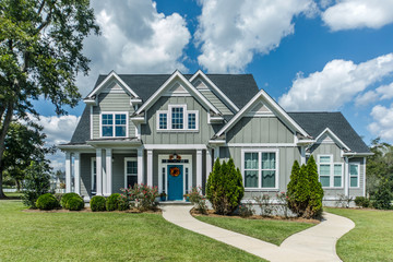 Gray New Construction Modern Cottage Home with Hardy Board Siding and Teal Door with Curb Appeal - obrazy, fototapety, plakaty