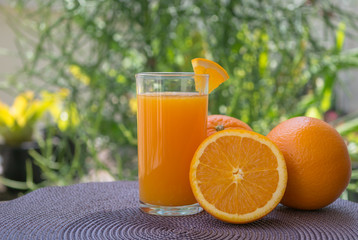 Orange juice, fruit,on table .