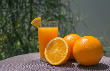 Orange juice, fruit,on table .