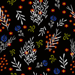 red flowers with white branches on a dark color