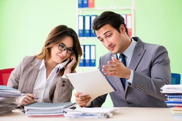 Two colleagues working in the office