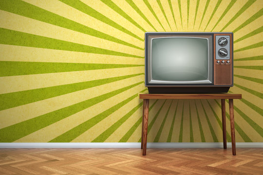 Retro old TV set on the vintage background.