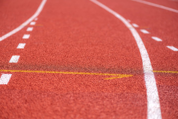 Close up of Running track pattern background in stadium.