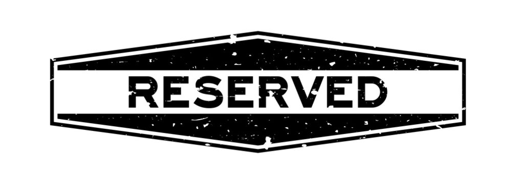 Grunge black reserved word hexagon rubber seal stamp on white background