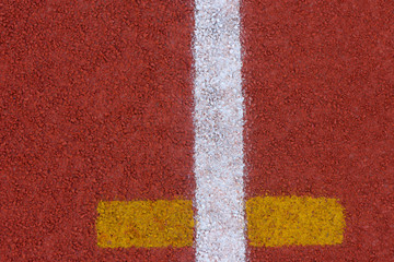Fototapeta na wymiar Close up of Running track pattern background in stadium.