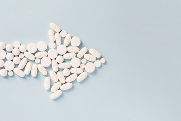 arrow of pills, health concept, direction to recovery