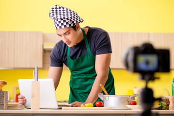 Young chef blogger explaining food preparation  