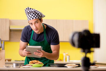 Young chef blogger explaining food preparation  