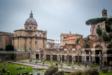 Fototapeta na wymiar Ruins and columns of Roman Forum in Rome, Italy