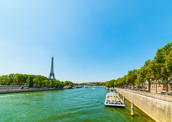 Seine river with world famous Eiffel tower on the background