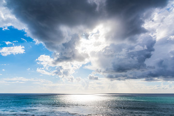 Naklejka na ściany i meble Dark clouds over the sea in Sardinia