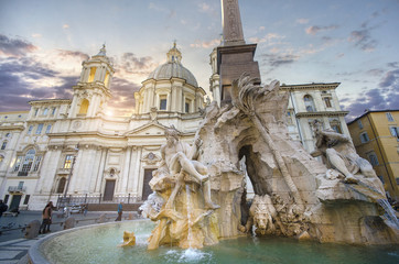 Fountain of the Four Rivers ( Fontana dei Quattro Fiumi ) in Piazza Navona. top sightseeing in The Eternal City, Rome, Italy. Top place for tourist visit. Landmark at sunset