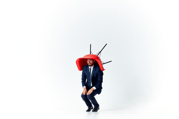 a chair on a man's head